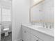 Elegant bathroom with double vanity and large mirror providing ample space and natural light at 1213 Captain Rivers Dr, Charleston, SC 29412
