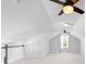 Bonus room showcasing carpeting, natural light, and staircase with wooden railing at 1213 Captain Rivers Dr, Charleston, SC 29412