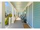 Inviting front porch featuring comfortable seating and a charming welcome mat at 1213 Captain Rivers Dr, Charleston, SC 29412