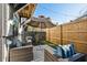 Private backyard patio with stylish seating and an umbrella, perfect for outdoor gatherings at 1213 Gatch Ct, Mount Pleasant, SC 29464