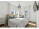 Bright bedroom featuring a chandelier, window views, and a comfortable bed and furniture at 1213 Gatch Ct, Mount Pleasant, SC 29464