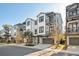 Stylish townhomes with modern architecture, multiple balconies, and well-manicured landscaping at 1213 Gatch Ct, Mount Pleasant, SC 29464