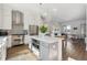 Bright, open kitchen with island, stainless appliances, and hardwood floors at 1213 Gatch Ct, Mount Pleasant, SC 29464