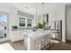 Modern kitchen with stainless appliances, quartz countertops, and an island with seating at 1213 Gatch Ct, Mount Pleasant, SC 29464