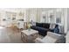 Bright living room with modern furniture, hardwood floors, and plenty of natural light at 1213 Gatch Ct, Mount Pleasant, SC 29464