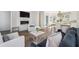 Open concept living area with fireplace, eat-in kitchen, and hardwood floors at 1213 Gatch Ct, Mount Pleasant, SC 29464