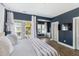 Main bedroom with balcony access, hardwood floors, and bright interior at 1213 Gatch Ct, Mount Pleasant, SC 29464