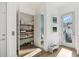 View of a well-organized walk-in pantry near a bathroom and a door to the outside at 1213 Gatch Ct, Mount Pleasant, SC 29464