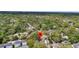 Scenic aerial perspective of property enveloped by lush trees in a serene residential area at 1249 Sumner Ave, North Charleston, SC 29406