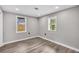 Bright bedroom with gray walls and new flooring at 1249 Sumner Ave, North Charleston, SC 29406