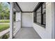 Inviting porch space featuring white railing and brick columns, offering a cozy spot to relax outdoors at 1249 Sumner Ave, North Charleston, SC 29406