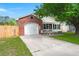 Inviting single-Gathering home with a well-maintained lawn, brick accents, and a garage, perfect for comfortable living at 1306 Markley Ct, Moncks Corner, SC 29461
