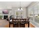 Inviting dining area with a fireplace and views of the outdoor space at 135 Marshside Dr, Summerville, SC 29485