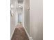 A bright hallway leads to carpeted rooms at 135 Marshside Dr, Summerville, SC 29485