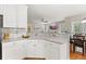 Bright, modern kitchen with granite counters and a breakfast bar at 135 Marshside Dr, Summerville, SC 29485