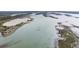An aerial view of the open waters, lakes, and land surrounding the real estate property at 1466 Mizzen Aly, Johns Island, SC 29455