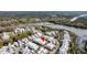 An aerial view of a real estate property in a neighborhood near a lake at 1466 Mizzen Aly, Johns Island, SC 29455