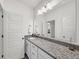 Modern bathroom featuring a granite countertop and an open view to the ensuite toilet at 1466 Mizzen Aly, Johns Island, SC 29455