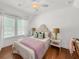 Bright bedroom with white walls, a ceiling fan, and two windows offering natural light and comfort at 1466 Mizzen Aly, Johns Island, SC 29455