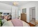 Inviting bedroom featuring a desk, dresser, closet, and a convenient ensuite bathroom at 1466 Mizzen Aly, Johns Island, SC 29455