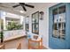 Charming outdoor seating on the porch featuring cozy cushions and a view of the surrounding greenery at 1466 Mizzen Aly, Johns Island, SC 29455