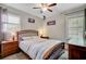 Primary bedroom with carpet, ceiling fan, and natural light at 1531 Seacroft Rd, James Island, SC 29412
