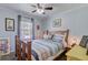Comfortable bedroom with ceiling fan, window and carpet at 1531 Seacroft Rd, James Island, SC 29412