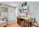 View of the entryway featuring a white front door, console table, and wood-look flooring at 1531 Seacroft Rd, James Island, SC 29412