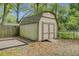 Shed featuring double doors, a ramp, and greenery around the storage structure at 1531 Seacroft Rd, James Island, SC 29412