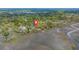 Aerial view showing property location near waterway, marsh, and residential neighborhood at 1673 Mcclain St, Charleston, SC 29407