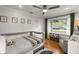 Sunlit Bedroom featuring a gray crib and decor at 1673 Mcclain St, Charleston, SC 29407