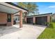 Modern garage with sleek black doors and brick accents providing ample parking at 1673 Mcclain St, Charleston, SC 29407