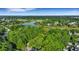 Expansive aerial view of a community featuring lush green spaces, waterways, and beautiful homes at 1857 W Canning Dr, Mount Pleasant, SC 29466