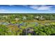Beautiful aerial view showcases homes nestled within a vibrant green landscape and winding waterways at 1857 W Canning Dr, Mount Pleasant, SC 29466