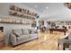 Spacious basement with a comfortable sofa, hardwood floors, and unique decor, creating a cozy atmosphere at 1857 W Canning Dr, Mount Pleasant, SC 29466