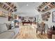 Basement with a pool table, wet bar, hardwood floors, and ample space for entertainment and relaxation at 1857 W Canning Dr, Mount Pleasant, SC 29466