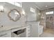 Bright bathroom with vanity and separate tub and shower featuring decorative tile at 1857 W Canning Dr, Mount Pleasant, SC 29466