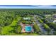 Beautiful aerial shot of a community pool area with lush landscaping and inviting amenities at 1857 W Canning Dr, Mount Pleasant, SC 29466