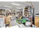Spacious garage equipped with ample storage and work space, including a lawn mower at 1857 W Canning Dr, Mount Pleasant, SC 29466