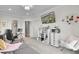 Versatile space featuring a cozy office setup with stylish decor and a comfortable seating area for relaxation at 1857 W Canning Dr, Mount Pleasant, SC 29466