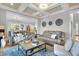 Living room featuring hardwood floors, modern decor, and recessed lighting at 1857 W Canning Dr, Mount Pleasant, SC 29466