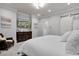 Bright main bedroom with a comfortable bed, elegant furnishings, and a relaxing atmosphere at 1857 W Canning Dr, Mount Pleasant, SC 29466