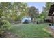 Backyard features shed, landscaping, and grassy lawn at 188 Ponderosa Dr, Ladson, SC 29456