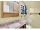 Bathroom features a granite-topped vanity, a window, and a mirrored medicine cabinet at 188 Ponderosa Dr, Ladson, SC 29456