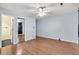 Spacious bedroom with wood-look flooring and a ceiling fan at 188 Ponderosa Dr, Ladson, SC 29456