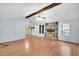 Spacious living room featuring hardwood floors and a beautiful stone fireplace at 188 Ponderosa Dr, Ladson, SC 29456
