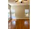 Bright bedroom with hardwood floors, ceiling fan, and natural light from multiple windows at 2000 Gray Battery Court Ct, Mount Pleasant, SC 29464