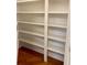 Spacious walk-in closet with white shelving and hardwood floors at 2000 Gray Battery Court Ct, Mount Pleasant, SC 29464