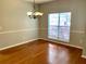 Dining room featuring hardwood floors, classic chandelier, and natural light at 2000 Gray Battery Court Ct, Mount Pleasant, SC 29464