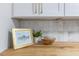 Bright kitchen featuring butcher block countertop and painted fish artwork at 201 Driver Ave, Summerville, SC 29483